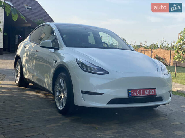 Белый Тесла Model Y, объемом двигателя 0 л и пробегом 58 тыс. км за 24000 $, фото 61 на Automoto.ua