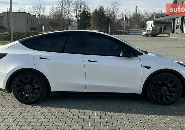 Білий Тесла Model Y, об'ємом двигуна 0 л та пробігом 63 тис. км за 28700 $, фото 6 на Automoto.ua