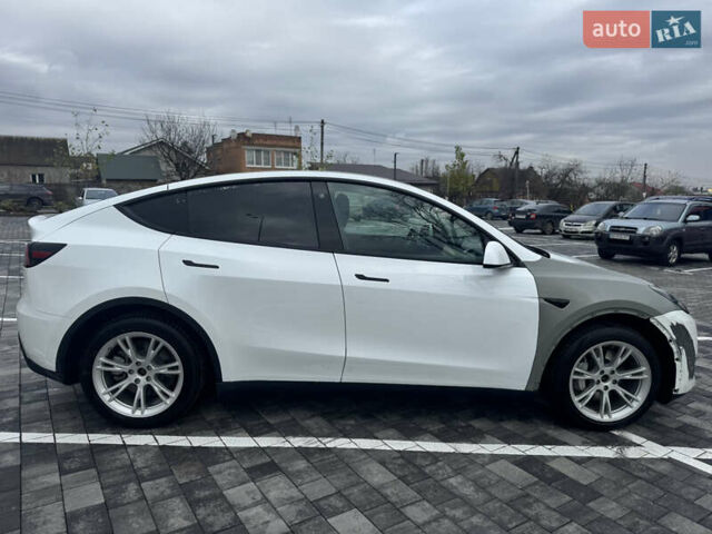 Білий Тесла Model Y, об'ємом двигуна 0 л та пробігом 100 тис. км за 23999 $, фото 10 на Automoto.ua