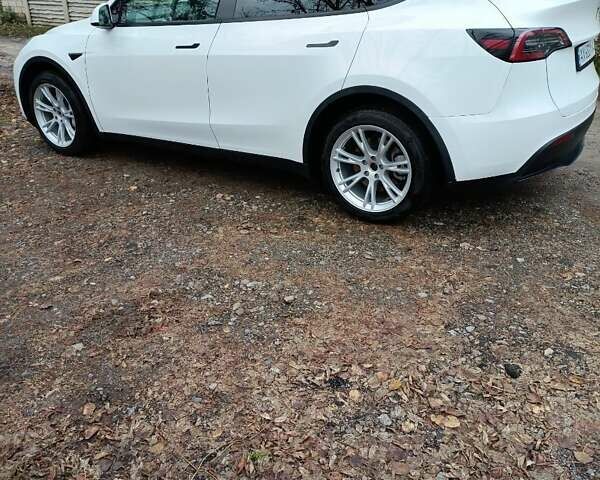 Белый Тесла Model Y, объемом двигателя 0 л и пробегом 52 тыс. км за 29000 $, фото 2 на Automoto.ua