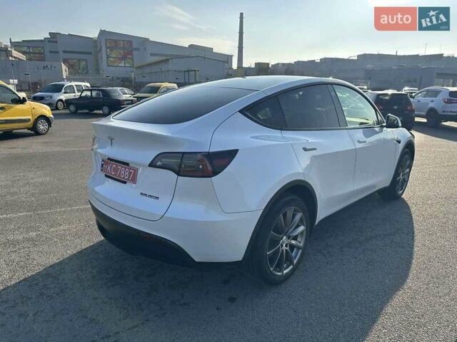 Білий Тесла Model Y, об'ємом двигуна 0 л та пробігом 61 тис. км за 22300 $, фото 5 на Automoto.ua