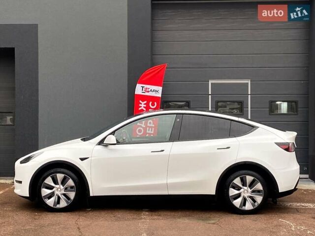 Білий Тесла Model Y, об'ємом двигуна 0 л та пробігом 81 тис. км за 32500 $, фото 5 на Automoto.ua