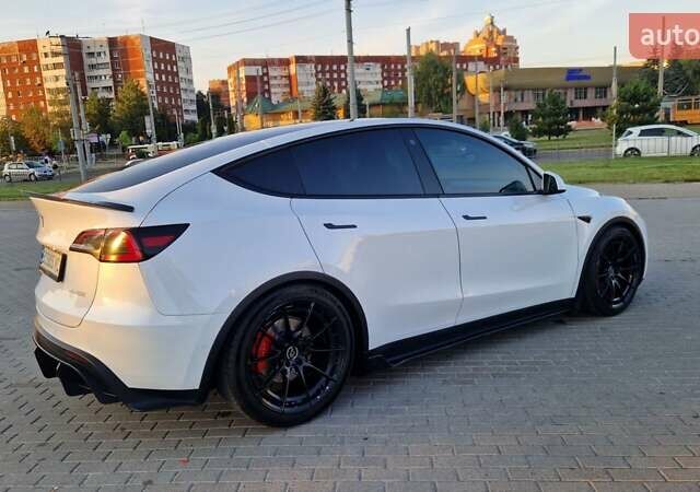 Белый Тесла Model Y, объемом двигателя 0 л и пробегом 87 тыс. км за 33000 $, фото 11 на Automoto.ua