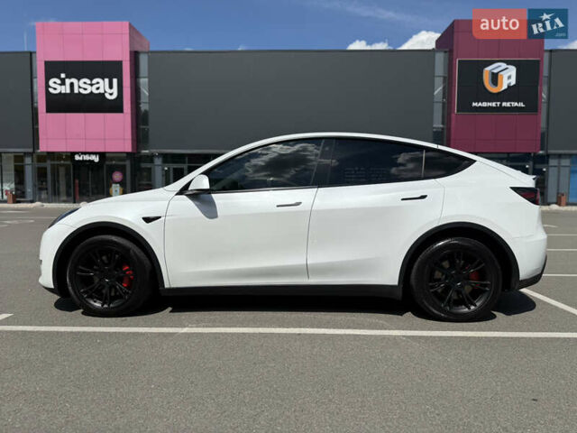 Білий Тесла Model Y, об'ємом двигуна 0 л та пробігом 90 тис. км за 31000 $, фото 2 на Automoto.ua