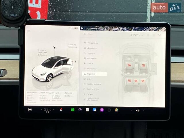 Білий Тесла Model Y, об'ємом двигуна 0 л та пробігом 81 тис. км за 32500 $, фото 19 на Automoto.ua
