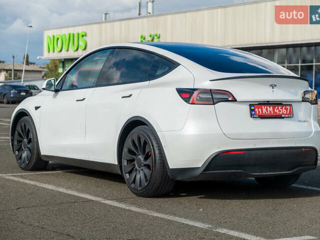 Белый Тесла Model Y, объемом двигателя 0 л и пробегом 51 тыс. км за 29500 $, фото 5 на Automoto.ua