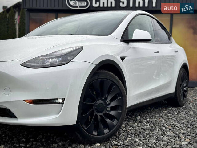 Білий Тесла Model Y, об'ємом двигуна 0 л та пробігом 62 тис. км за 27400 $, фото 5 на Automoto.ua