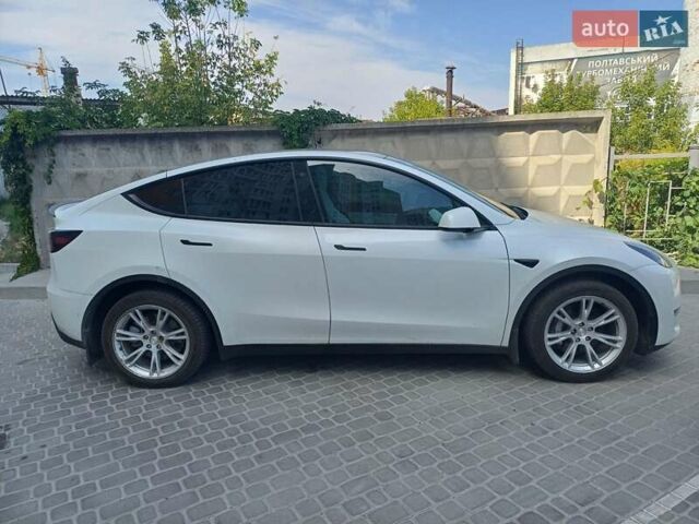 Белый Тесла Model Y, объемом двигателя 0 л и пробегом 61 тыс. км за 26000 $, фото 3 на Automoto.ua