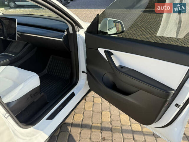 Белый Тесла Model Y, объемом двигателя 0 л и пробегом 102 тыс. км за 26000 $, фото 14 на Automoto.ua
