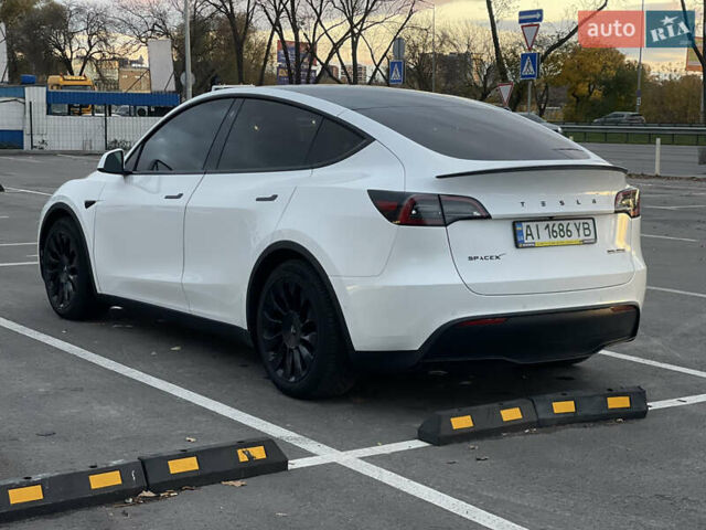 Белый Тесла Model Y, объемом двигателя 0 л и пробегом 117 тыс. км за 23200 $, фото 1 на Automoto.ua