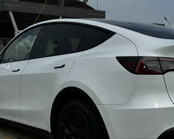 Белый Тесла Model Y, объемом двигателя 0 л и пробегом 91 тыс. км за 29600 $, фото 2 на Automoto.ua