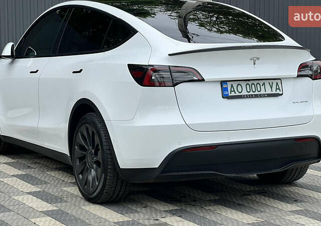 Белый Тесла Model Y, объемом двигателя 0 л и пробегом 90 тыс. км за 34999 $, фото 11 на Automoto.ua