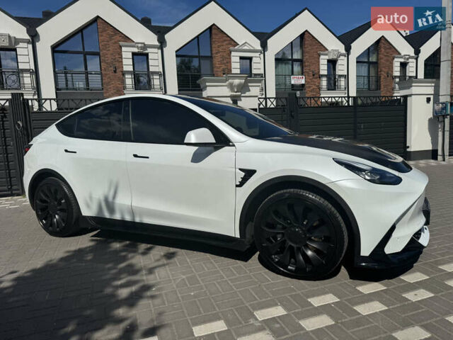Белый Тесла Model Y, объемом двигателя 0 л и пробегом 62 тыс. км за 39500 $, фото 4 на Automoto.ua