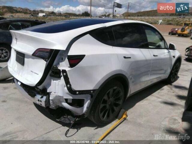Белый Тесла Model Y, объемом двигателя 0 л и пробегом 49 тыс. км за 28000 $, фото 5 на Automoto.ua