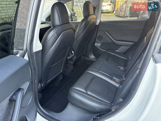 Белый Тесла Model Y, объемом двигателя 0 л и пробегом 141 тыс. км за 18300 $, фото 12 на Automoto.ua