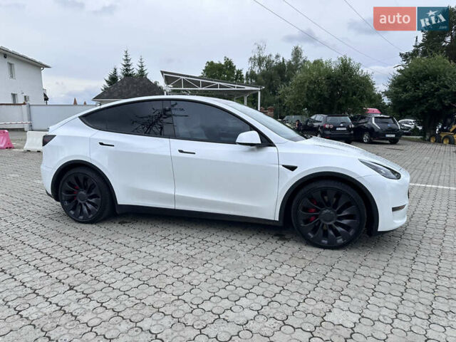 Білий Тесла Model Y, об'ємом двигуна 0 л та пробігом 49 тис. км за 32500 $, фото 41 на Automoto.ua