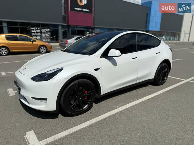 Білий Тесла Model Y, об'ємом двигуна 0 л та пробігом 90 тис. км за 31000 $, фото 1 на Automoto.ua