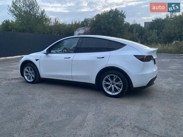 Белый Тесла Model Y, объемом двигателя 0 л и пробегом 58 тыс. км за 24000 $, фото 25 на Automoto.ua