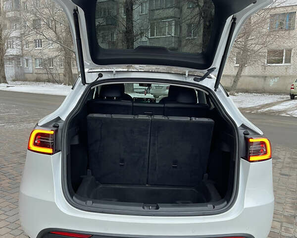 Белый Тесла Model Y, объемом двигателя 0 л и пробегом 56 тыс. км за 35000 $, фото 16 на Automoto.ua