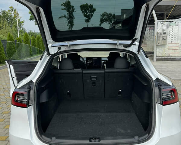 Белый Тесла Model Y, объемом двигателя 0 л и пробегом 91 тыс. км за 29600 $, фото 25 на Automoto.ua