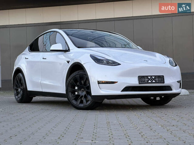 Белый Тесла Model Y, объемом двигателя 0 л и пробегом 47 тыс. км за 25900 $, фото 1 на Automoto.ua
