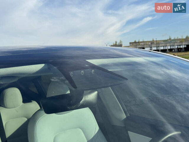Белый Тесла Model Y, объемом двигателя 0 л и пробегом 51 тыс. км за 31000 $, фото 25 на Automoto.ua