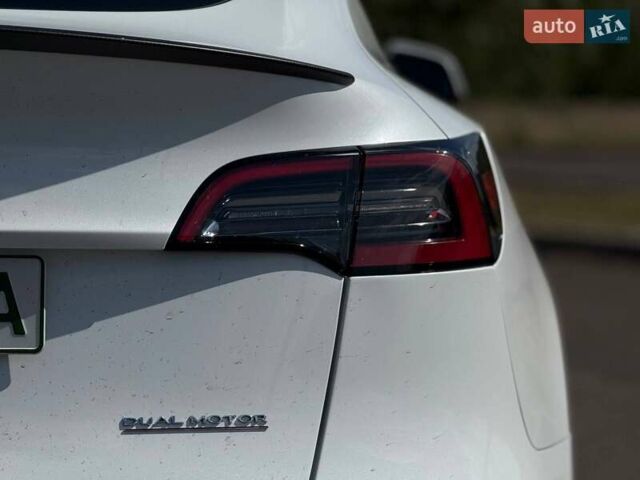 Білий Тесла Model Y, об'ємом двигуна 0 л та пробігом 56 тис. км за 26000 $, фото 20 на Automoto.ua