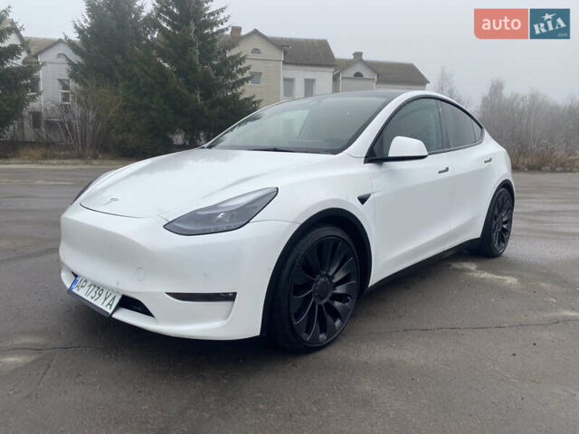 Белый Тесла Model Y, объемом двигателя 0 л и пробегом 58 тыс. км за 29500 $, фото 1 на Automoto.ua
