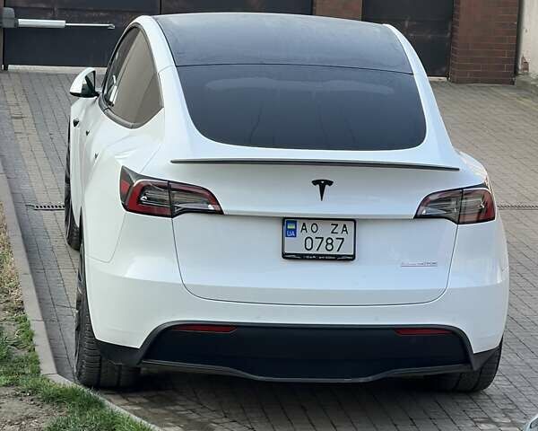 Білий Тесла Model Y, об'ємом двигуна 0 л та пробігом 41 тис. км за 49999 $, фото 4 на Automoto.ua