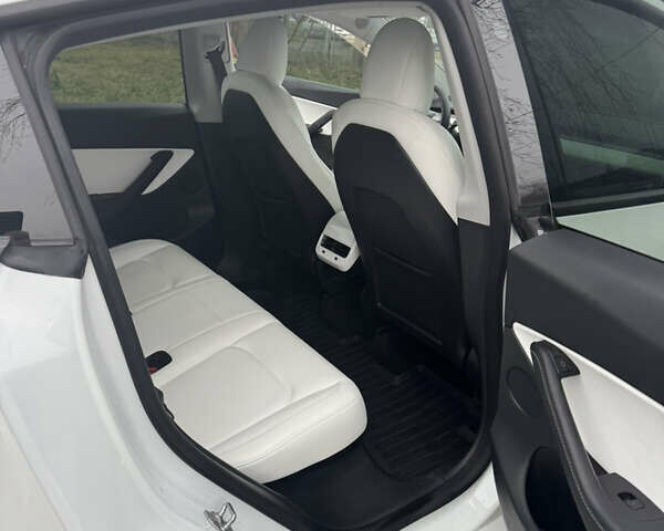 Білий Тесла Model Y, об'ємом двигуна 0 л та пробігом 83 тис. км за 26400 $, фото 16 на Automoto.ua