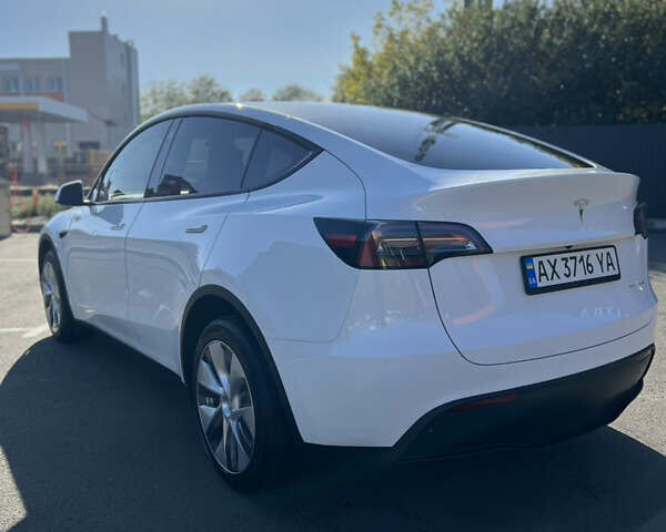 Белый Тесла Model Y, объемом двигателя 0 л и пробегом 24 тыс. км за 28200 $, фото 1 на Automoto.ua