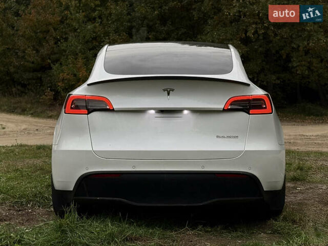 Тесла Model Y 2022 у Городке на Automoto.ua Білий Тесла Model Y, об'ємом двигуна 0 л та пробігом 102 тис. км за 28200 $, фото 7 на Automoto.ua