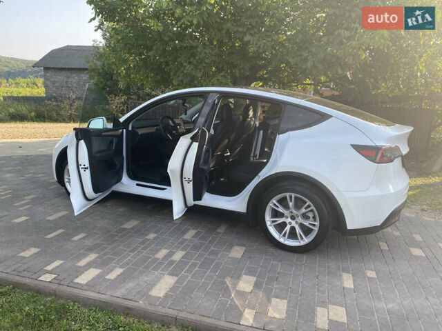 Белый Тесла Model Y, объемом двигателя 0 л и пробегом 58 тыс. км за 24000 $, фото 38 на Automoto.ua