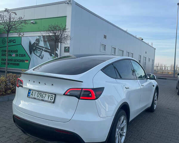 Білий Тесла Model Y, об'ємом двигуна 0 л та пробігом 60 тис. км за 24900 $, фото 3 на Automoto.ua