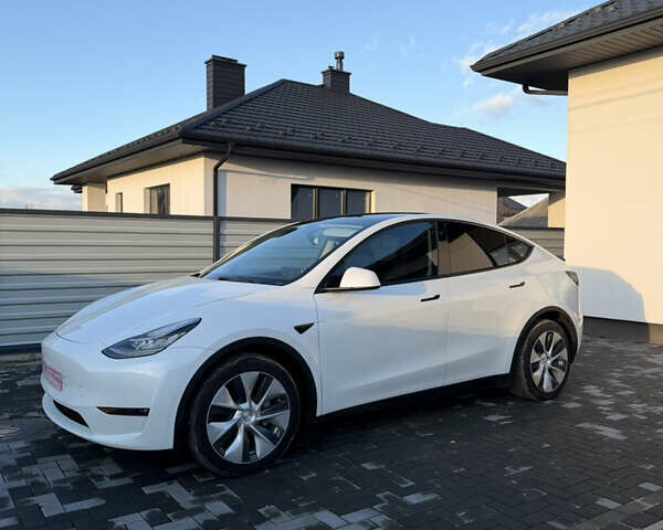 Білий Тесла Model Y, об'ємом двигуна 0 л та пробігом 52 тис. км за 26000 $, фото 19 на Automoto.ua