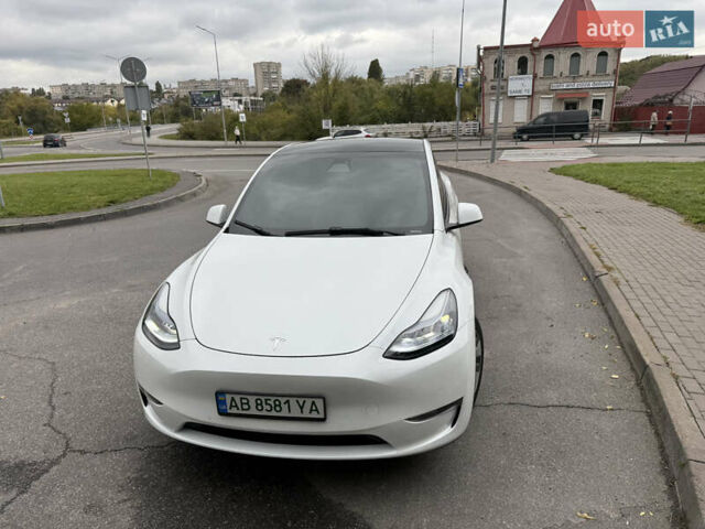 Білий Тесла Model Y, об'ємом двигуна 0 л та пробігом 82 тис. км за 25499 $, фото 2 на Automoto.ua