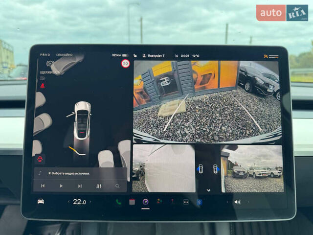 Білий Тесла Model Y, об'ємом двигуна 0 л та пробігом 62 тис. км за 27400 $, фото 45 на Automoto.ua