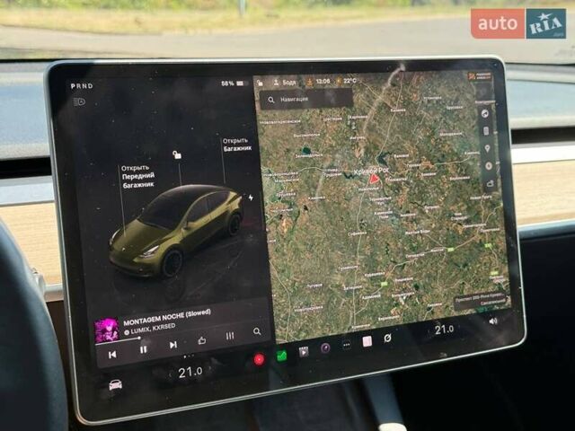 Білий Тесла Model Y, об'ємом двигуна 0 л та пробігом 56 тис. км за 26000 $, фото 51 на Automoto.ua