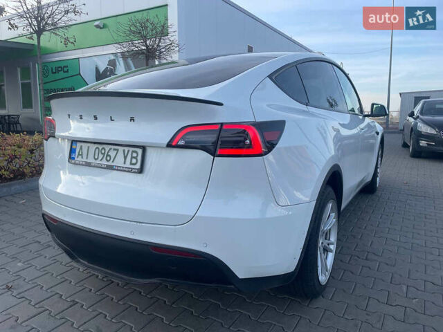 Білий Тесла Model Y, об'ємом двигуна 0 л та пробігом 60 тис. км за 24900 $, фото 12 на Automoto.ua