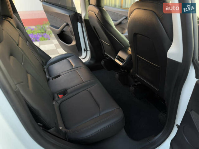 Белый Тесла Model Y, объемом двигателя 0 л и пробегом 59 тыс. км за 28950 $, фото 37 на Automoto.ua