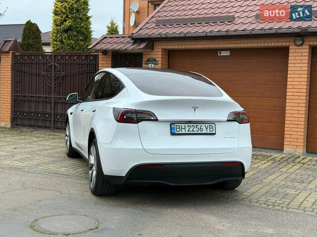 Белый Тесла Model Y, объемом двигателя 0 л и пробегом 57 тыс. км за 25000 $, фото 11 на Automoto.ua