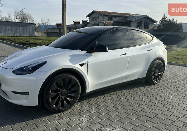 Білий Тесла Model Y, об'ємом двигуна 0 л та пробігом 63 тис. км за 28700 $, фото 25 на Automoto.ua