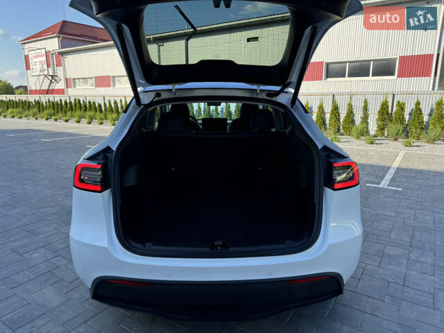 Білий Тесла Model Y, об'ємом двигуна 0 л та пробігом 79 тис. км за 25500 $, фото 10 на Automoto.ua
