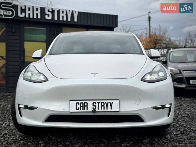 Білий Тесла Model Y, об'ємом двигуна 0 л та пробігом 62 тис. км за 27400 $, фото 7 на Automoto.ua