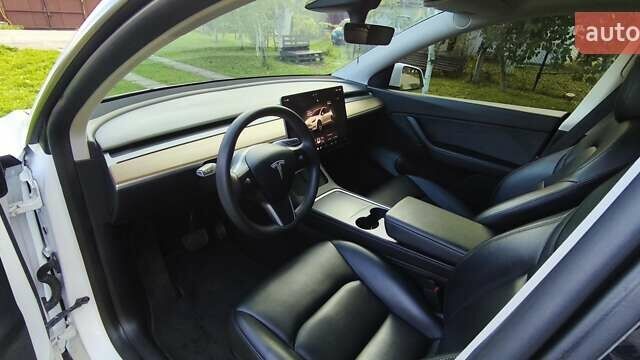 Белый Тесла Model Y, объемом двигателя 0 л и пробегом 69 тыс. км за 23500 $, фото 12 на Automoto.ua