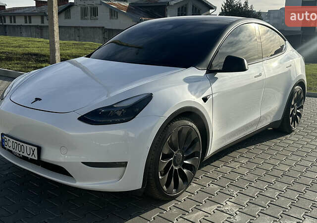 Білий Тесла Model Y, об'ємом двигуна 0 л та пробігом 63 тис. км за 28700 $, фото 1 на Automoto.ua