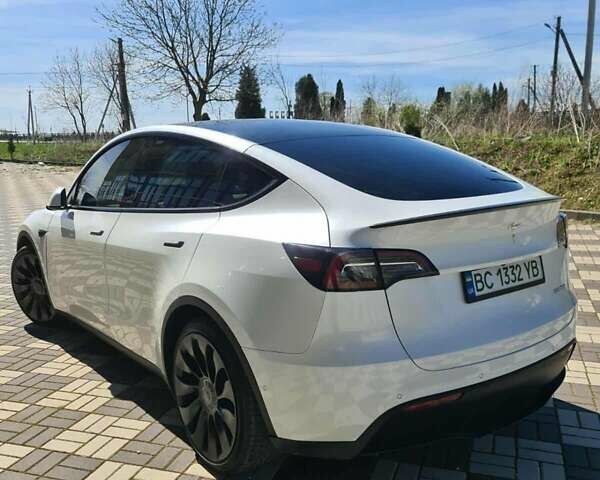 Белый Тесла Model Y, объемом двигателя 0 л и пробегом 54 тыс. км за 28000 $, фото 6 на Automoto.ua