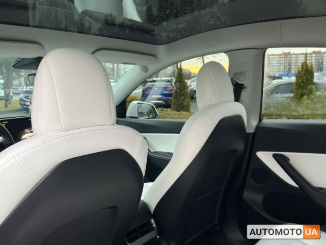 Белый Тесла Model Y, объемом двигателя 82 л и пробегом 35 тыс. км за 32700 $, фото 12 на Automoto.ua