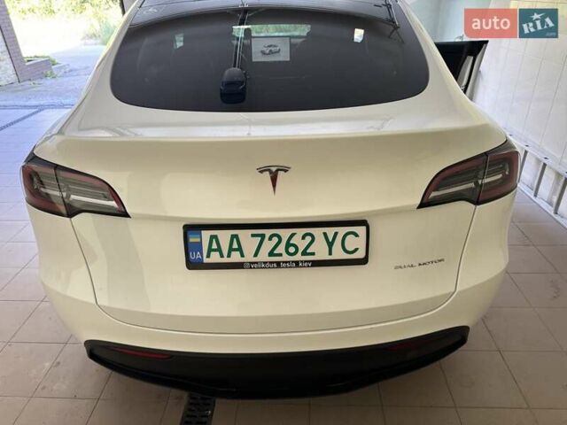 Белый Тесла Model Y, объемом двигателя 0 л и пробегом 76 тыс. км за 32800 $, фото 1 на Automoto.ua