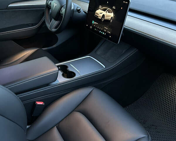 Белый Тесла Model Y, объемом двигателя 0 л и пробегом 58 тыс. км за 40000 $, фото 22 на Automoto.ua